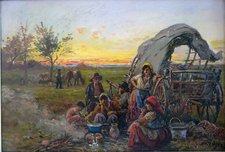 Zigeuner am Lagerfeuer in der Abenddämmerung